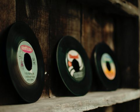 set of colorful vinyl records in old fashioned store